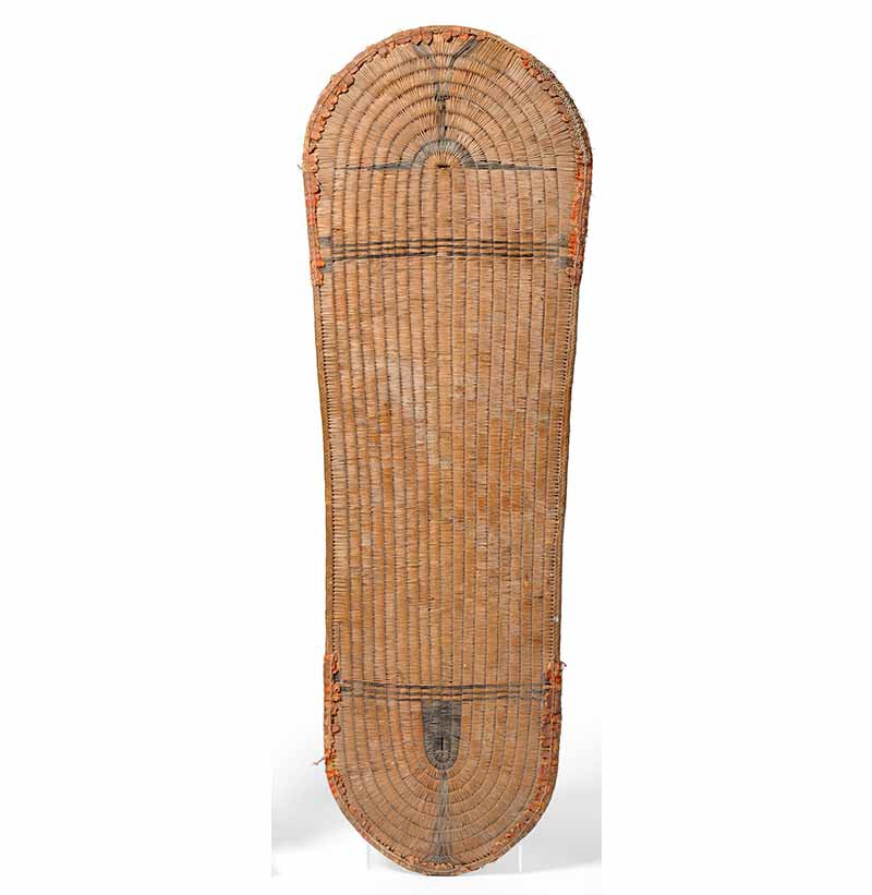 A Solomon Islands Wicker Shield, of classical tapering oblong form