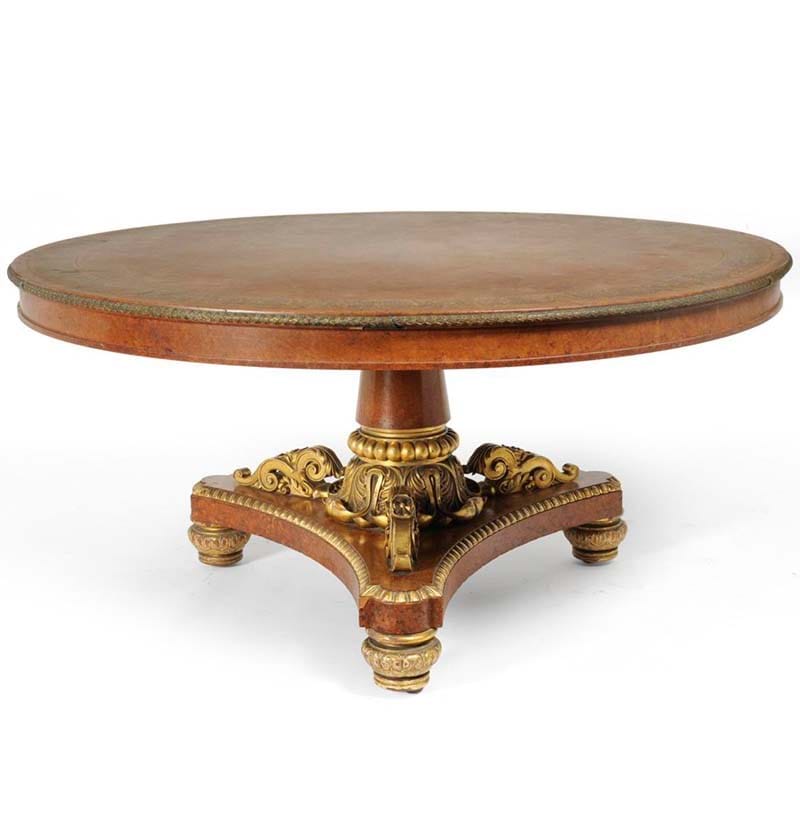 A George IV Amboyna, Purplewood, Marquetry and Parcel Gilt Circular Dining Table, in the manner of Morel & Seddon, circa 1827