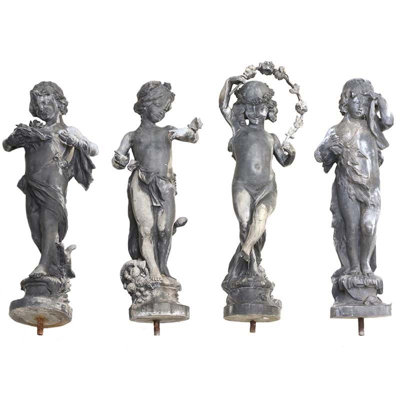 A Rare Set of Four Bromsgrove Guild Lead Figures of The Seasons, early 20th century