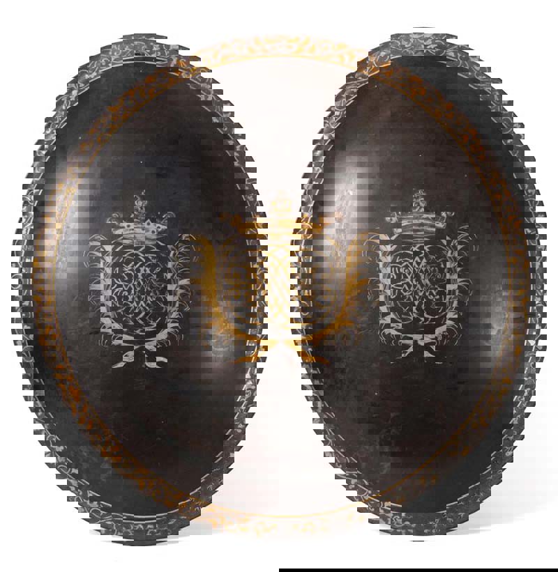 A Japanese Edo Period Black Lacquer Shield, circa 17th Century