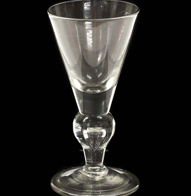 A Heavy Baluster Wine Glass, circa 1710