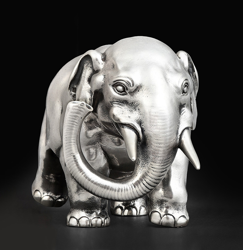A Russian Silver Table-Lighter in the Form of an Indian Elephant, by Fabergé, With Imperial Warrant, St Petersburg, 1899-1908